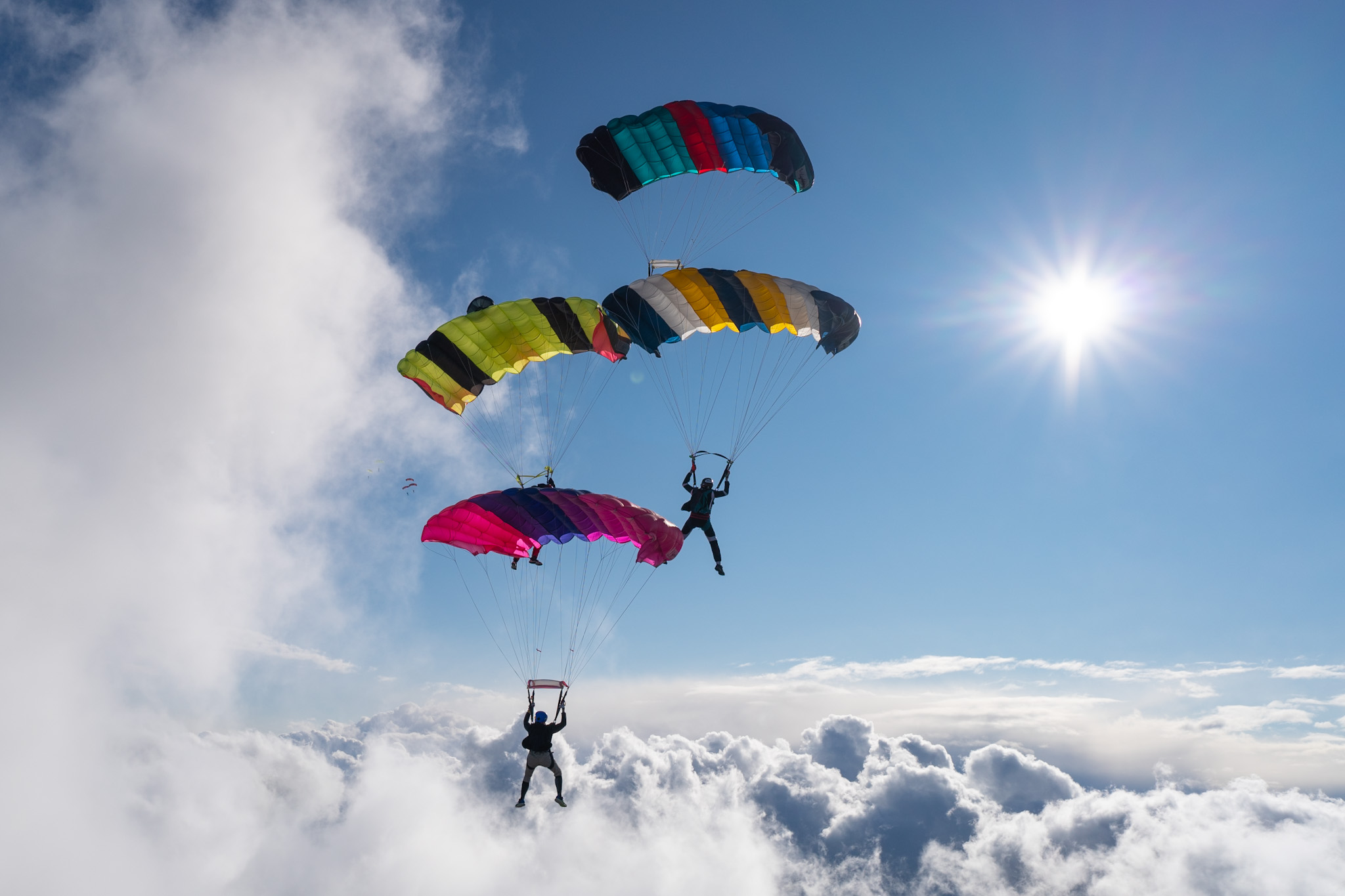 A group of skydivers in the sky