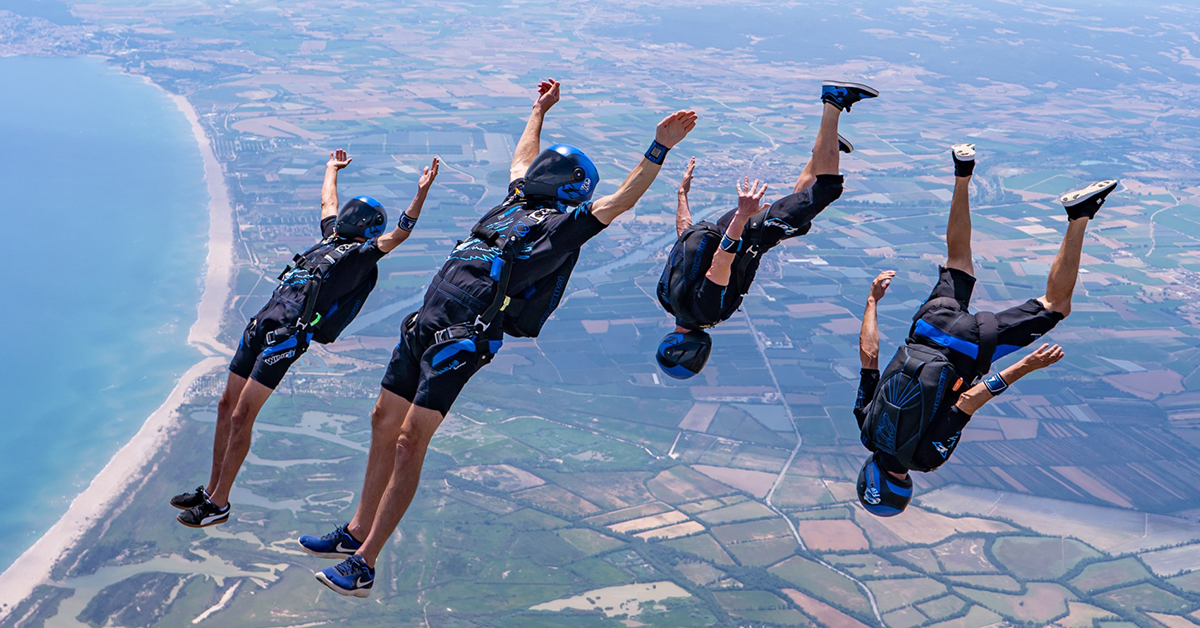 Four skydivers in freefall