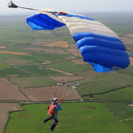 Lone diver parachuting down.