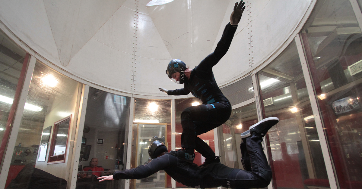 Nik Daniel and Brianne Thompson of AXIS Flight School show off, a little bit