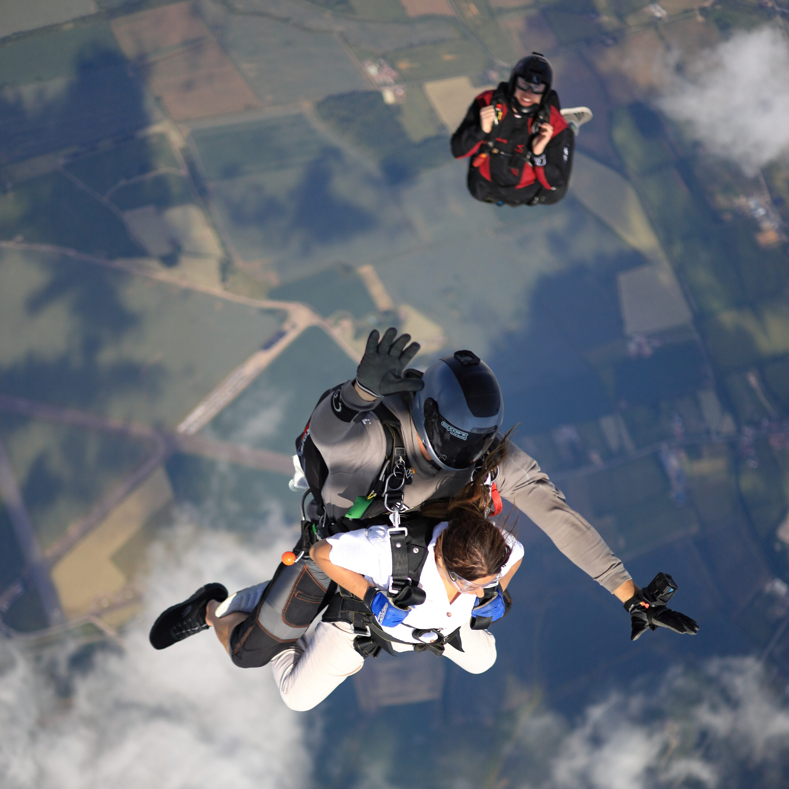 Skydivers mid-freefall