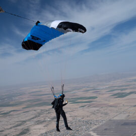 Skydiver over a desert
