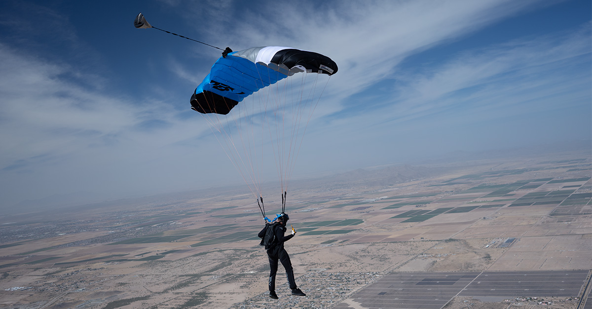 Skydiver over a desert