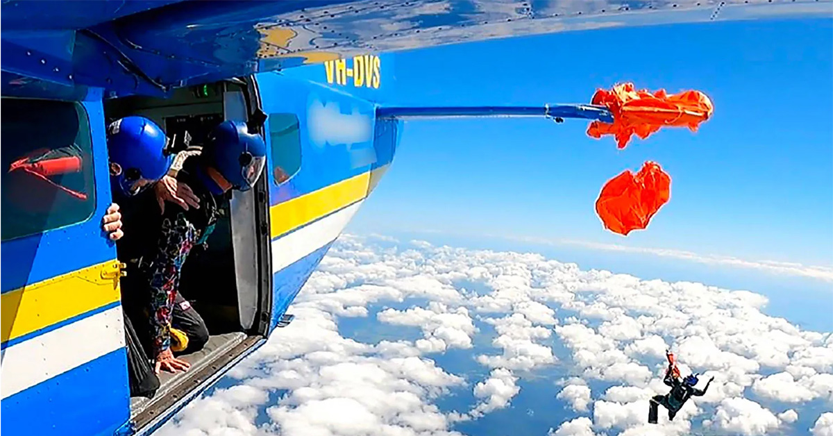 Adrian's reserve shoot catches on the wing of the plane.