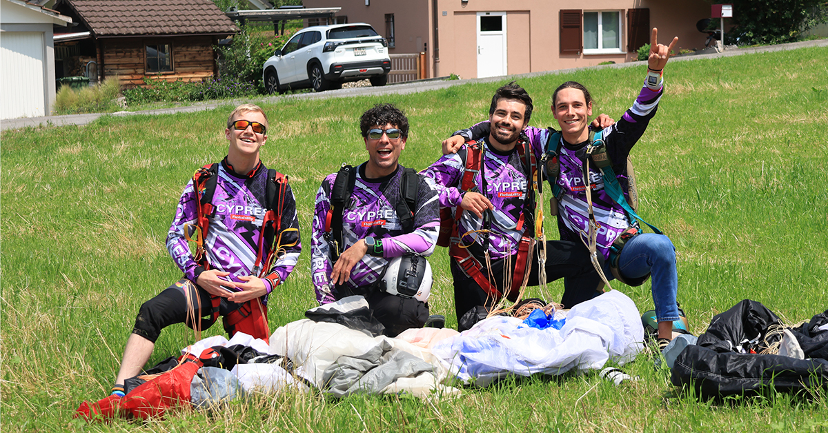CYPRES skydivers pose together.